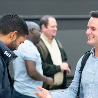 Two male classmates talking