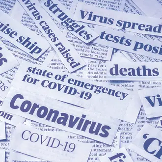 Various coronavirus newspaper headline clippings
