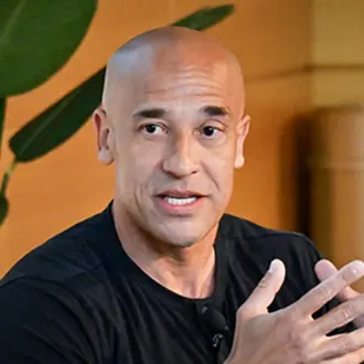 Marcus Wilson speaks with Interim Dean Perakis at MIT Sloan Reunion 2024.