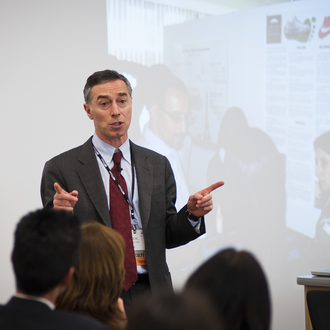 Image of Richard M. Locke making a presentation