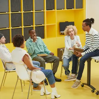 Five workers are having a discussion