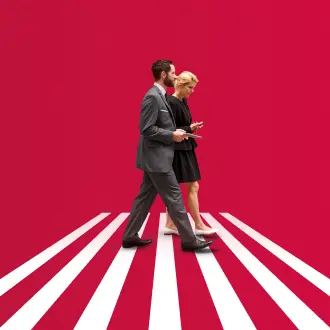 Graphic of two people in business attire walk across the screen on a red background with white stripes