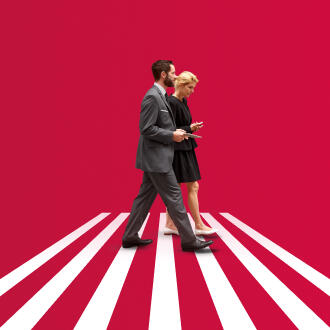 Graphic of two people in business attire walk across the screen on a red background with white stripes