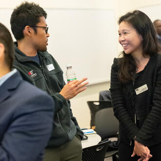 Two EMBA students having a discussion