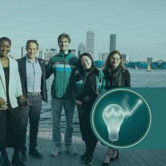 SISC working group members in front of the Boston skyline