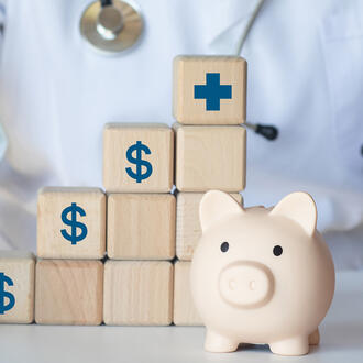 Doctor with piggybank