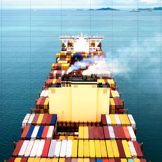 A cargo ship sails in the sea with emissions. A spreadsheet is overlayed on top.