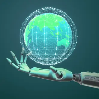 A robot hand holds a world globe