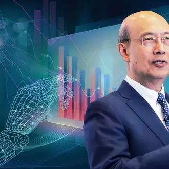 Andrew Lo presenting with AI financial imagery in the background