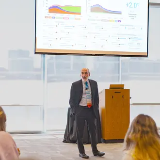 John Sterman presenting en-ROADS climate simulator tool