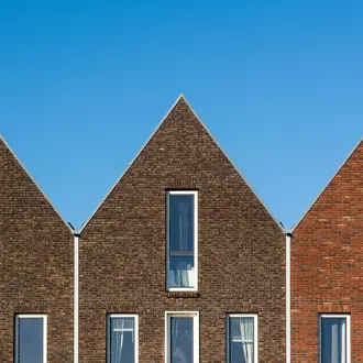 Brick Houses Under the Blue Sky