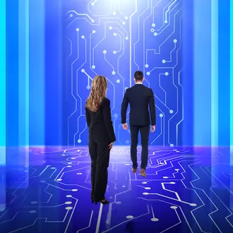 Two business people walk through a hallway that looks like a circuit board