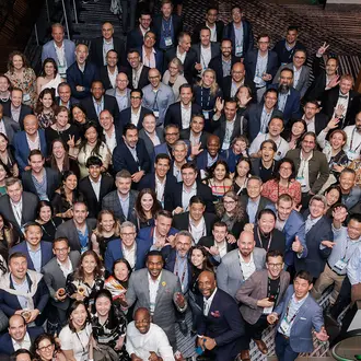 Large group of people pose for photo
