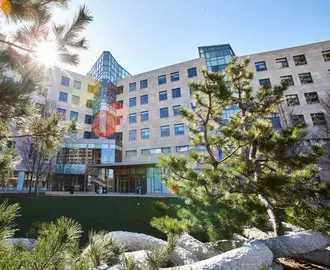 Exterior shot of the Main Street side of MIT Sloan's building E62.