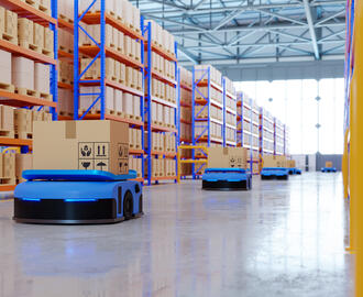 image of robots on a factory floor as part of an automated supply chain