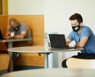 A photo of students working on campus