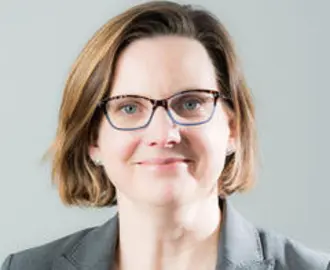 Headshot of MIT Sloan Professor Erin L. Kelly