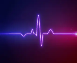 Stylized blue, purple, and red ECG reading on black background