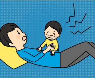 Distressed father holds crying child