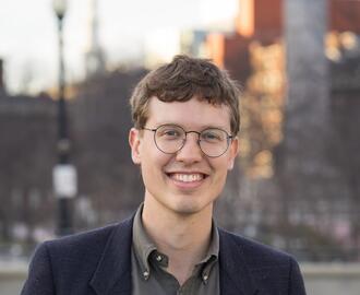Headshot of MIT Sloan Associate Professor Nathan Wilmers