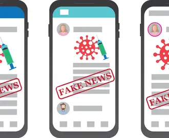 Cell phone with COVID 19 molecule, syringe and Fake News