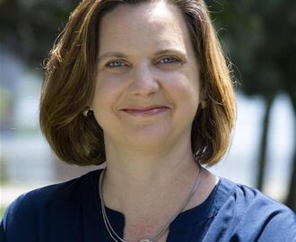 Headshot  of MIT Sloan Professor Erin L. Kelly