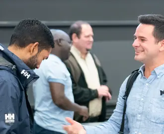 Two male classmates talking