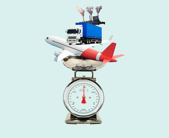 A plane, truck, and factory with smoke stack sit on top of a scale