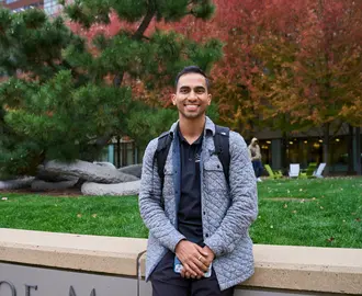 LGO student Abhi Rao smiles at the camera