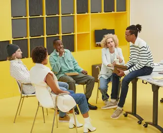 Five workers are having a discussion