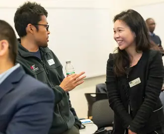 Two EMBA students having a discussion