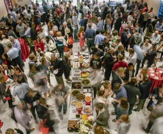 A time lapse of a large group of people at an event
