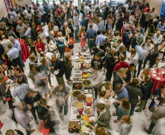 A time lapse of a large group of people at an event