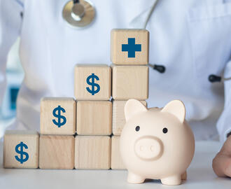 Doctor with piggybank