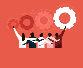 A team embraces each other in front of cogwheels