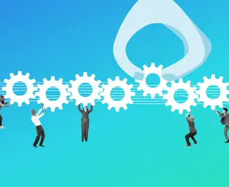 A group of workers lifts and pushes cogwheels