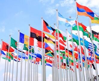 collection of country flags flying