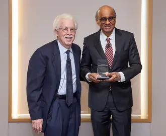 President Tharman Shanmugaratnam receiving the Miriam Pozen Prize from Bob Pozen