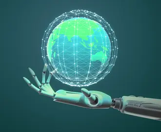 A robot hand holds a world globe