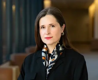 Headshot of a woman indoors