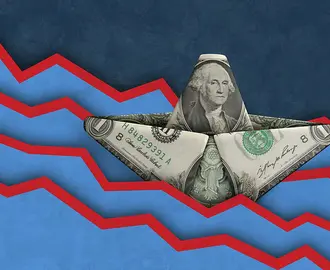 A dollar bill paper boat floats amid turbulent waters