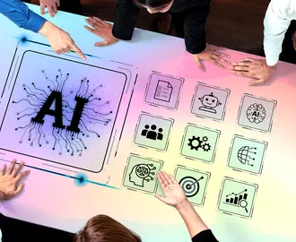 Employees surround a table with various AI graphics