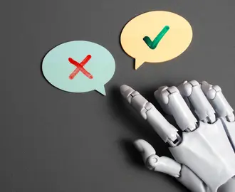 Robot hand pointing to speech bubbles with a check mark and an "X" mark