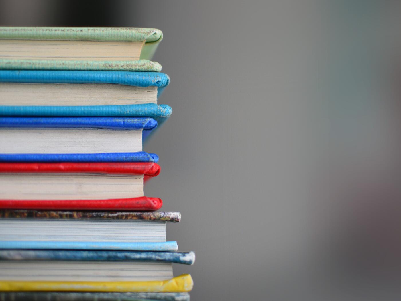 Close up photo of a stack of books 