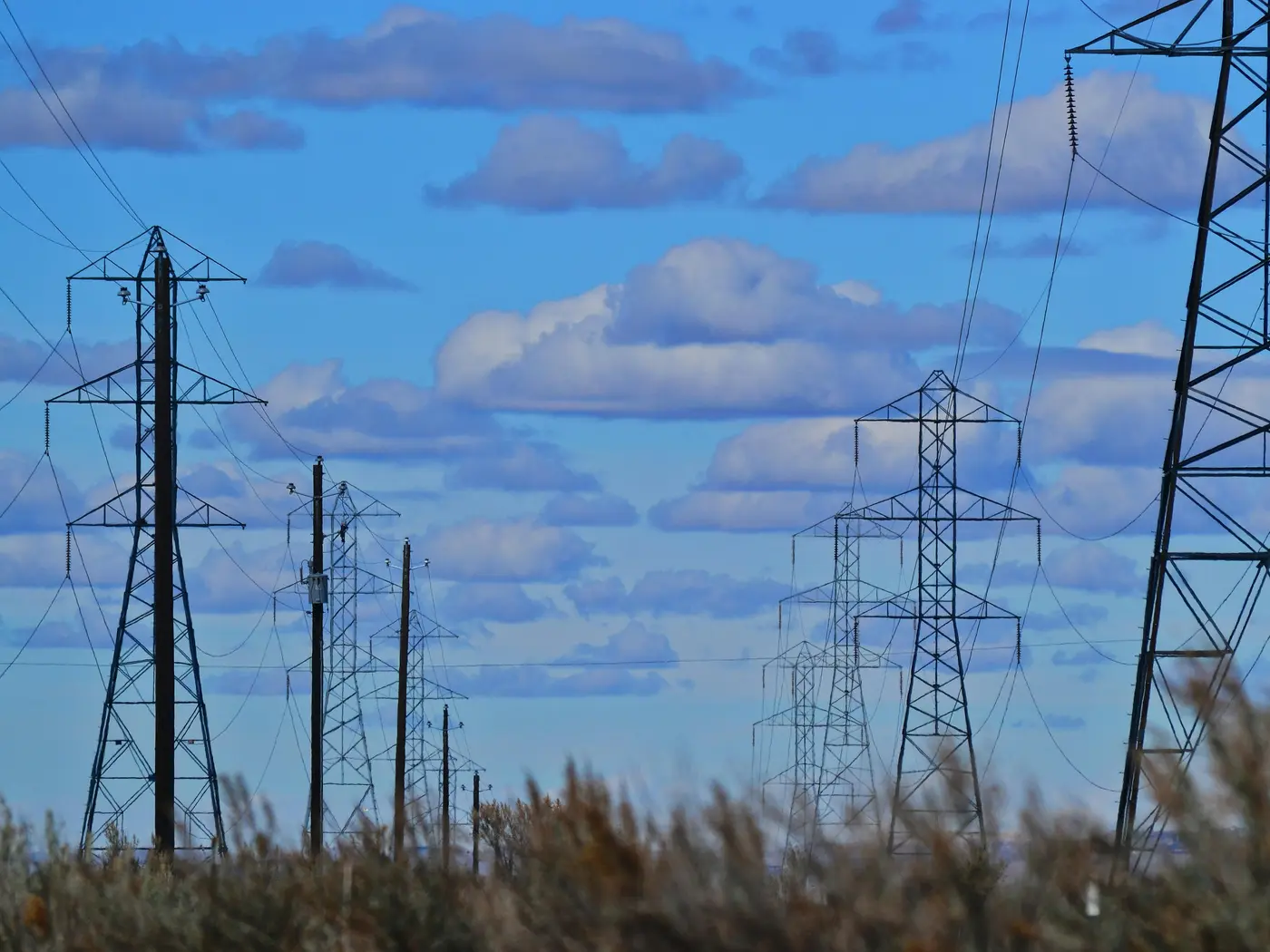 Transmission lines in the daylight with cloud cover