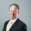 Headshot of MIT Sloan Professor Chris Knittel