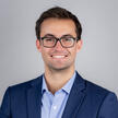 headshot of current PhD student, Chuck Downing