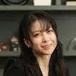 Smiling woman poses for photograph