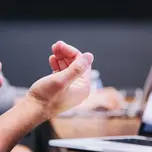 Person presenting in a work setting