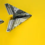 $100 dollar bills made into paper airplanes